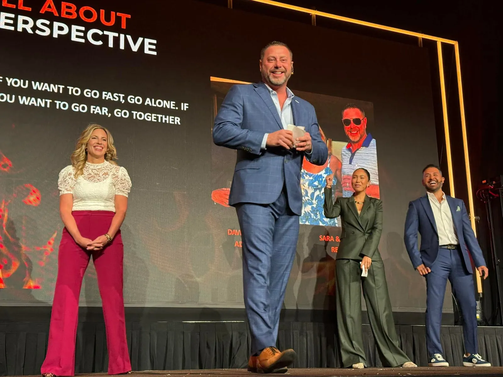 Sara & Jerrod Reineke speaking on stage